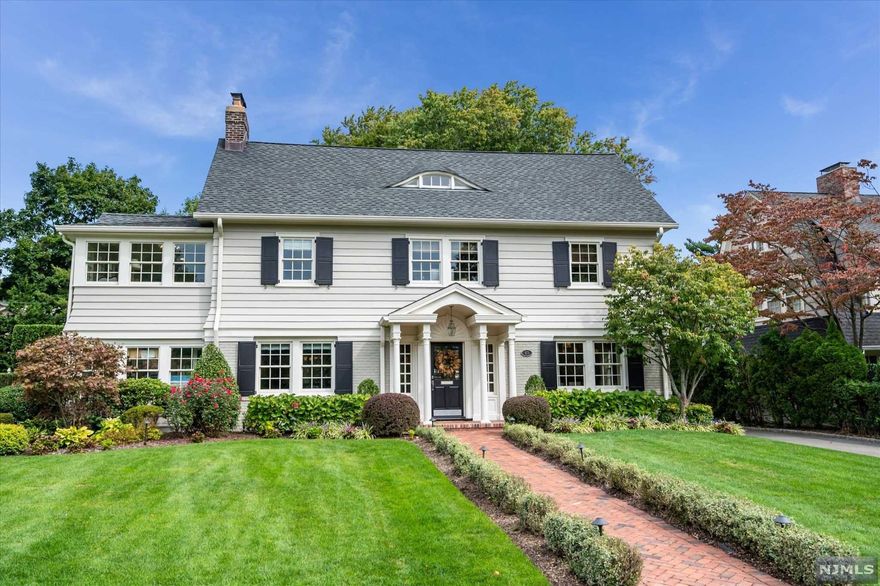 Understated luxury married with warmth & comfort best describes this classic colonial built by high-end builder. No detail overlooked in this stunning home. Open kitchen with Danby countertops, custom cabinetry, 6-burner Viking stove & double ovens, 2 dishwashers, wine fridge, prep sink in mahogany island with seating for 6! Cozy separate dining area with coffered ceilings open to light-filled family room with French doors out to paver patio & private level yard. Mudroom with custom cabinetry, LR w/fireplace & custom built-ins & lovely window seat. Newer windows throughout, multi-zone cooling/heating, beautiful hdwd floors. 2nd fl features 5 bedrooms including 1 with ensuite & primary suite with sitting room, 2 closets & oversized bathroom. 3rd floor has bedroom, bath, and den. So close to Walnut St. train & village. jitney to GR train at the corner. Close to top-rated schools! 4,328 sq ft as per tax record. Photos represent home prior to current owners possession.