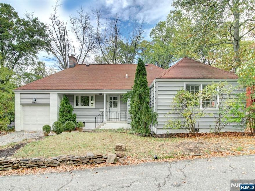 Welcome to 712 Northfield! Tucked away on a peaceful cul-de-sac near local parks, this beautifully updated Ranch offers comfort and versatility across three levels. The main floor features two spacious bedrooms and a full bath, while the newly finished walk-up level showcases a private primary suite with its own full bathroom. The lower level provides additional recreation space, a half bath, separate laundry area, and generous storage. Enjoy the warmth of the wood-burning fireplace, unwind on the lemonade porch, or relax in the expansive backyard. Complete with a one-car garage and thoughtful updates throughout, this home is move-in ready and waiting for its new owners.