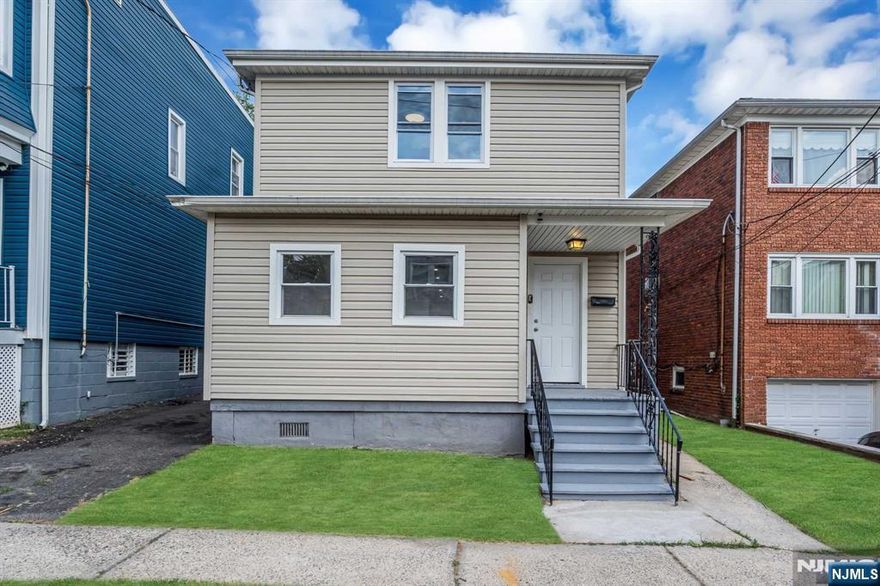 Welcome to 30 42nd Street in Irvington, NJ " a beautifully renovated, fully vacant two-family home on the Maplewood border.This property offers a fantastic opportunity for homeowners and investors alike, combining modern updates with income-generating potential. Unit 1 features three spacious bedrooms, a luxurious tiled bathroom, and a brand-new kitchen with stainless steel appliances. Unit 2 offers two bedrooms, a sleek modern kitchen with stainless steel appliances, and a charming breakfast bar, perfect for casual dining. Both units are equipped with new forced hot air systems, have access to a newly built deck, and share a spacious backyard ideal for relaxation or entertaining. Additional amenities include a semi-finished basement for storage and a private driveway for parking convenience. Notably, the property has received a 30% reduction in assessed taxes following a successful appeal, and the township has recently been reappraised, which should further lower the annual taxes