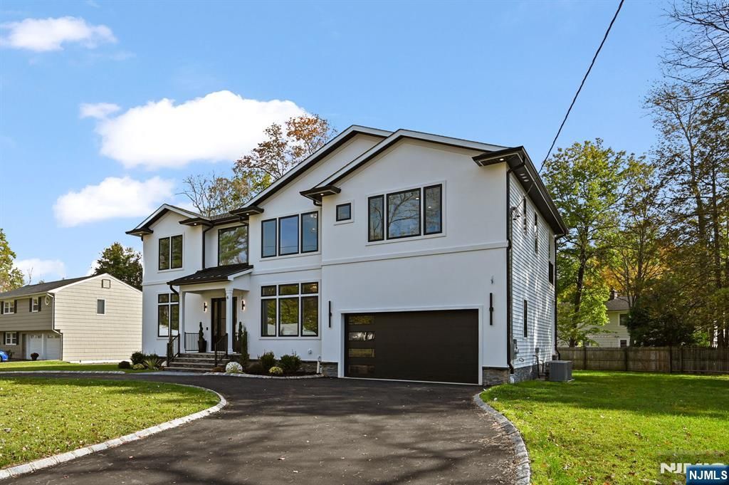 Photo of 6 Sparrow Drive, Livingston, NJ 07039 (MLS # 25034053)