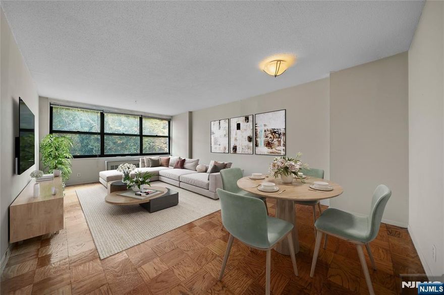 *Contact WENDY GAMEZ 917-504-3347 for a tour* One of the largest one-bedroom residences at the iconic Galaxy Towers, Residence 11E offers approximately 870 square feet of refined living with all utilities included. This bright, move-in-ready home features an expansive, sun-filled open layout and a fully equipped modern kitchen designed for both style and functionality. Residents enjoy a premier resort-style lifestyle with indoor and outdoor pools, a state-of-the-art fitness center with a dedicated weight room, sauna, tennis courts, library, and 24-hour concierge service, complemented by premium on-site conveniences including a deli, spa, pharmacy, and dry cleaner. Ideally located for effortless commuting, the Port Imperial Ferry is just five minutes away, with express bus service to Manhattan approximately ten minutes from your door. Annual taxes are $5,297.33. Monthly HOA of $1,078 includes water, hot water, sewer, gas, heat, and electric. Parking is available at $120/month. A rare opportunity to own a spacious, full-service residence offering elevated comfort, convenience, and lifestyle.