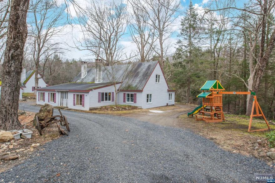 To see it is to take in the beauty of this 14 acre property and to really appreciate the originality of this home!To describe it w/ words or photos is just not enough!Imagine hearing the sound of Cascade Lake emptying into your backyard.Imagine hiking, fishing, swimming or just enjoying nature in your own private oasis.This, not like any other property, offers not 1 but, 2 homes! The main home is so unique and intriguing,offering 5 bedrms,1 bath,living rom, family rm w/cathedral wood plank ceiling, dining room,galley kitchen,gorgeous double sided fireplace,roughed 2nd bath is waiting for you to bring your own vision to this one of a kind home.In addition the second home on the property offers,1 bedr, 1 bath,kitchen&living rm, w/ multiple storage rms that could be converted into rooms, as well as laundry rm & roughed plumbing for baths in many areas.Take advantage of all what Warwick has to offer and all the endless possibilities for this 2 home and 14 acre property.