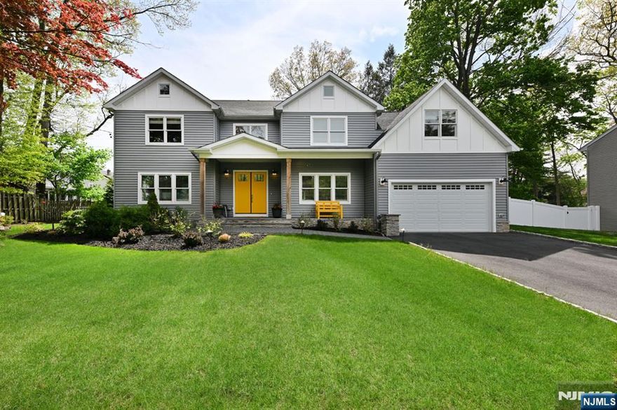 This magnificent 5 Bedroom, 3.5 Bath Center Hall Colonial is absolutely stunning and is ideally situated in a quiet location while in the heart of Westwood! 5 Year Young home built on original foundation offering over 3400 sq. ft! Elegant two-story entry foyer opens to the formal living room, gourmet kitchen with butcher block center island, high-end appliances, wet bar, and is fully open to the dining room and exquisite family room with gas fireplace & coffered ceiling, mud room area, walk-in pantry and powder room. Main floor also includes a spacious bedroom ensuite with elegant bath/walk-in shower. 2nd floor landing overlooks the entry and leads to the primary suite with 2 walk-in closets, stunning bath w/soaking tub, large shower stall and double sinks. Continued 2nd floor offers 3 large bedrooms, full bath and laundry. Amazing closet space! Beautiful finished lower level offers rec room, addt'l fam room, office area, exercise room and utilities. Two Car Garage offers epoxy flooring. Exterior offers a welcoming front porch, park-like, immense 103 x 177 property with specimen trees, privacy, immense stone patio with built-in fire pit, gas line for the grill, plenty of room to play and plenty of room for a pool! Perfect location with close proximity to the Vibrant Downtown of Westwood with shops, restaurants, train, bus and parks. LOVE WHERE YOU LIVE!