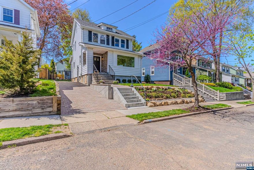 Welcome to 58 Windsor Road, a stunning example of modern elegance nestled in the heart of desirable Oradell. This meticulously renovated residence offers the perfect blend of sophistication, comfort, and convenience. This home has undergone a comprehensive renovation, ensuring every detail reflects contemporary style and functionality.The main living areas boast an open layout,ideal for entertaining or simply enjoying daily life. Sun-drenched interiors and sleek finishes create an inviting atmosphere.The fenced in yard offers a finished shed with a hang out area. Other key features,new plumbing,force hot air and central air,all new HVAC, Stainless steel appliances,quartz countertops,crown molding & ceiling fans throughout! Finished basement complete with a full bathroom.There is extensive storage in this home!It also features a stone veneer front,& a paver driveway too! Also a sodded lawn & new landscape! Located near train station,transportation,shopping,schools,parks & dining!