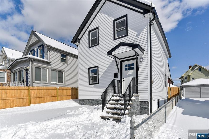 pacious and beautiful newly finished basement offers much possibility. New Heating and AC systems. Exterior has new Roof, siding, windows,gutters, masonry details. Kitchen grants access to small porch and deep yard enhanced by masonry work and privacy fence. New exterior insulation behind siding , and interior behind sheet rock for efficient and enjoyable heating and cooling. A MUST SEE HOME!!