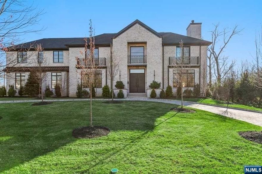 No other new construction can compare! Built in 2022, exquisite 7 bedroom transitional style home set on a perfectly flat, professionally landscaped park like 1 acre on Tenafly's East Hill. Almost 12,000sf of luxury living with the most outstanding architectural details with white oak floors throughout. Gourmet kitchen with breakfast area featuring highest quality appliances, two sinks, two dishwashers and walk-in pantry. Banquet sized dining room, stunning great room, library/office complete first level with 6 firep throughout with an elevator serving three floors. Second level offers a luxury primary bedroom with sitting area 2 large walk-in closets, fireplace and spa like bath. Completing 2nd level are 4 ensuite bedrooms and laundry. Full finished lower level offers movie theater, gym, bedroom, full bath, wine cellar and wet bar. Backyard with inground pool, cabana and full outdoor kitchen with radiant heated floors. Smart home, superb school system and minutes from NYC.