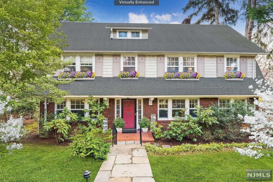 Looking for a home 3 blocks from Anderson Park, Upper Montclair Midtown Direct Train Station and Upper Montclair Village. We have found your house! This 5 Bedroom 3.1 Bath Center Hall Colonial with high ceilings has a large Eat In updated Kitchen with Montreal gunstock floors, spacious Living Room with a gas fireplace and deep moldings, an entertainer's size Dining Room with wainscoting, and a Sun Room with windows on 3 sides. The large Master Bedroom Suite includes an office/nursery space. Two of the corner Bedrooms offer New York City skyline views. The Master Bath and Hall Bathroom have both been updated. A wide staircase leads up to the 3rd floor Bedroom a vintage Bathroom with footed tub and a large Attic. The lower level is partially finished with a Rec Room and a Sauna. 2 zone Central A/C too. Outside, there is a patio located off the Kitchen and a side yard with a cozy seating area. All this, so close to the Village, Mountainside Park's pool and tennis, Presby Iris Gardens