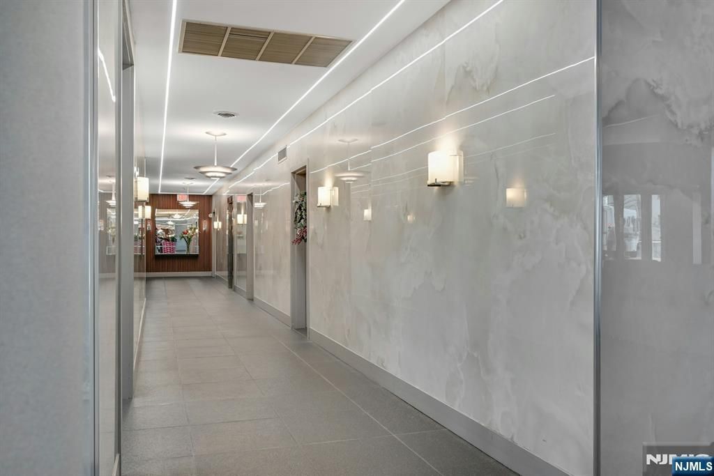 Photo of 1530 Palisade Avenue #23S, Fort Lee, NJ 07024 (MLS # 25042617)