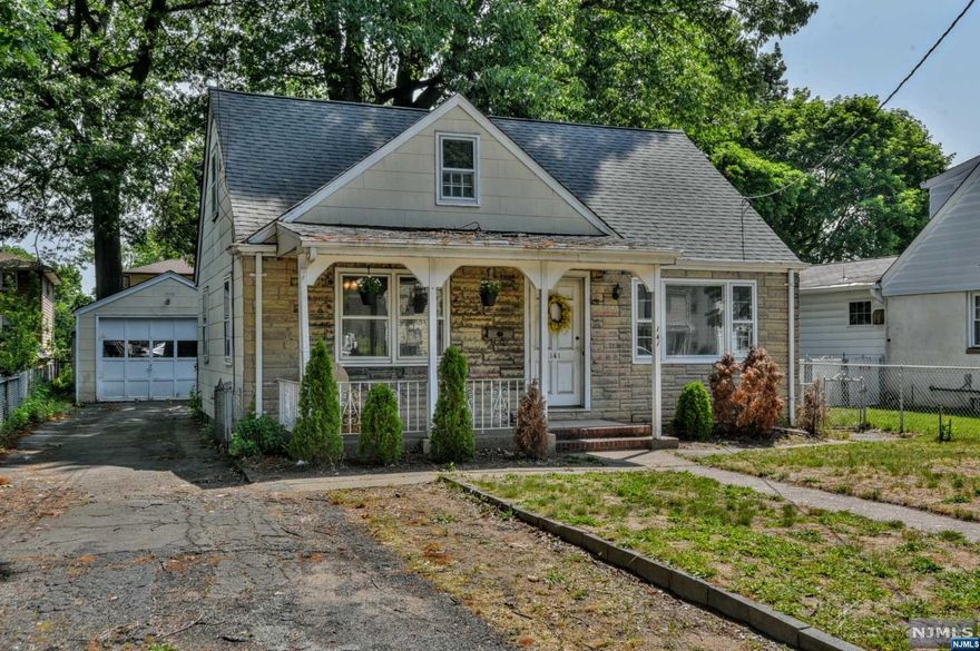 EXCELLENT OPPORTUNITY IN BERGEN COUNTY! Second floor is a walk up attic available for you to expand on this home. Also a basement with many possibilities. This lovely home also offers a large kitchen, hardwood floors, inviting rocking chair front porch, fenced back yard, garage with portico/patio, and storage shed. Convenient location to transportation, highways, NYC, malls, etc.