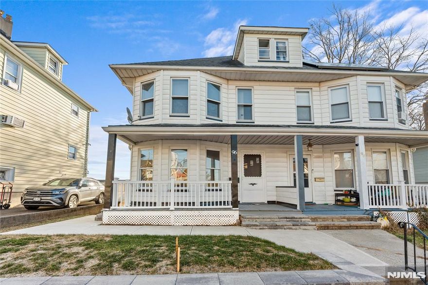 Welcome to Bergen County! Step into this fully renovated, approximately 2,400 sq ft attached 3 Bedroom 2.5 Bath townhouse offering four expansive levels of living space plus a finished walk-out basement, ideally located in East Rutherford, New Jersey. This exceptional renovated home truly has it all. Upon entry, you are welcomed by a bright open-concept layout highlighted by a renovated kitchen and a large kitchen window showcasing breathtaking New York City skyline views. The home features 3 spacious bedrooms and 2.5 beautifully renovated bathrooms, with hardwood flooring throughout and central AC for year-round comfort. The finished walk-out basement is a true standout, offering its own private entrance and a full renovated bathroom, making it ideal for extended living, guests, or added rental potential. The finished walk-up attic provides flexible space that can easily serve as a fourth bedroom, home office, or recreation room. Best of all, this property is HOA-free no monthly fees, making it a rare and attractive investment opportunity or low-maintenance home. Enjoy low taxes and an unbeatable location just minutes from NYC, only 5 minutes from MetLife Stadium host of the 2026 World Cup and the American Dream Mall. The open floor plan is perfect for entertaining, while the backyard offers stunning skyline views that elevate everyday living. Don't miss your chance to own this fully renovated Bergen County gem where location, lifestyle, and value come together perfectly.