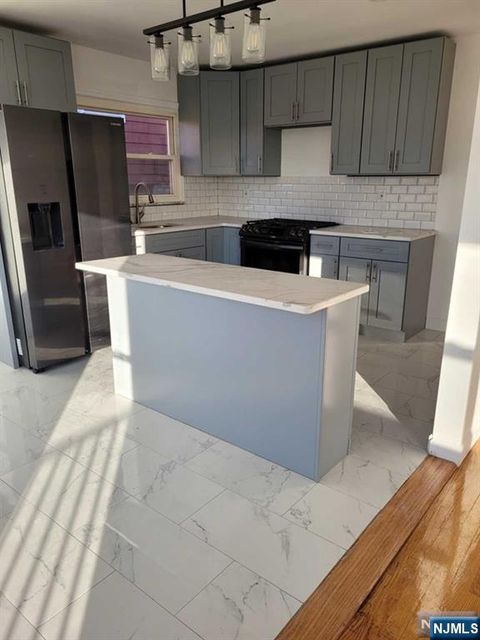Photo of 224 11th St, Palisades Park, NJ 07650 (MLS # 26010695)