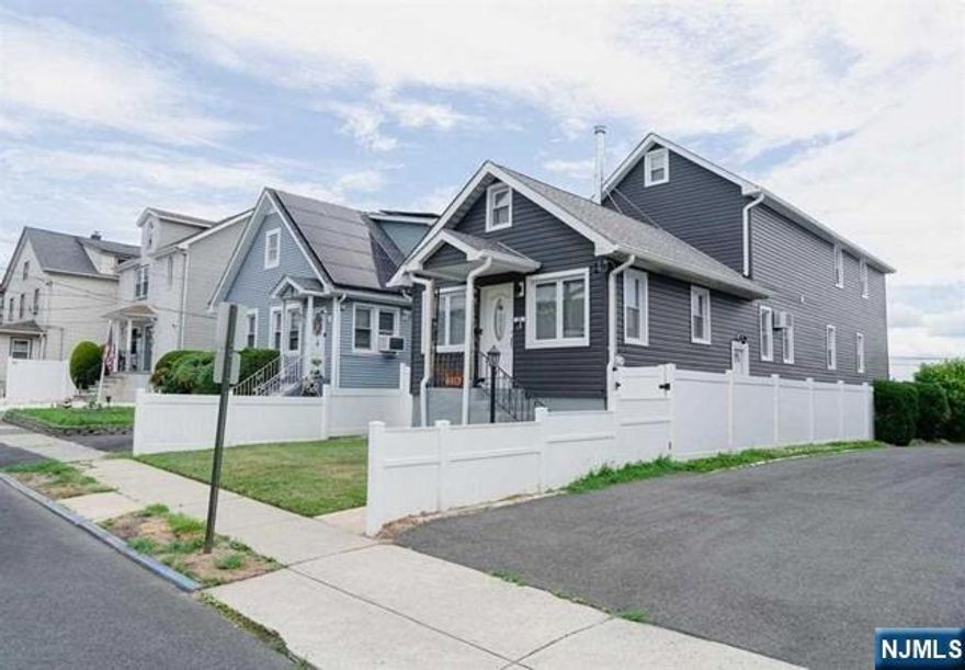 "Highest & Best due Friday 8/22/24" Come home to this stunning 5 bedroom, 3 bathroom home in Lyndhurst NJ, where suburban comfort harmonizes with urban convenience! Recently expanded to approximately 3,000 sq ft across three stories, this home boasts a spacious and adaptable layout perfect for families and those seeking a tranquil home environment nestled within a vibrant community. A standout feature is the third-level master suite, complete with an ensuite bath, laundry, an oversized walk-in closet, and a private terrace offering stunning views of the Meadowlands and the iconic New York City skyline. The home has undergone significant renovations including new siding, roof, windows, and more, ensuring that the groundwork is laid for the new owners to personalize and complete the space to their liking. Transportation options are plentiful with a nearby commuter rail station and NJ Transit bus stop to NYC, ensuring stress-free commuting.