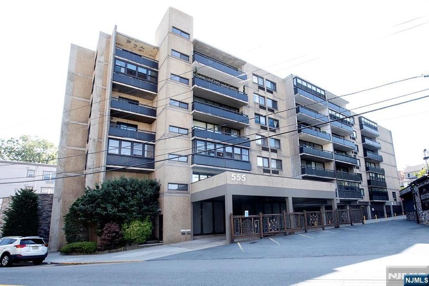 The Chateau Condominium â€“ This spacious and sun-filled one-bedroom home on the 5th floor offers approximately 861 sq. ft. of comfortable living. The open floor plan features a modern kitchen with granite countertops, stainless steel appliances, and high-quality cabinetry. Beautiful hardwood floors run throughout the residence, while a large private balcony extends off the living/dining areaâ€”perfect for relaxing or entertaining. Laundry facilities are conveniently located on each floor. Ideally situated just steps from dining, shopping, and the NYC express bus stop, this home offers the perfect balance of style, comfort, and convenience.