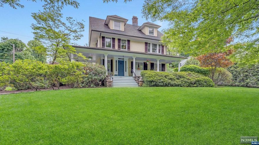 1905 Ridgewood Colonial with Huge Wrap Around Porch. Original beautiful Chestnut Trim, Pocket Doors and Stained Glass Windows. Only 2 owners have had the opportuity to Love this 3 Story Home! Short distance to Downtown Ridgewood Restaurants and Shopping, Train, Award Winning Schools and Dunham Nature Trail