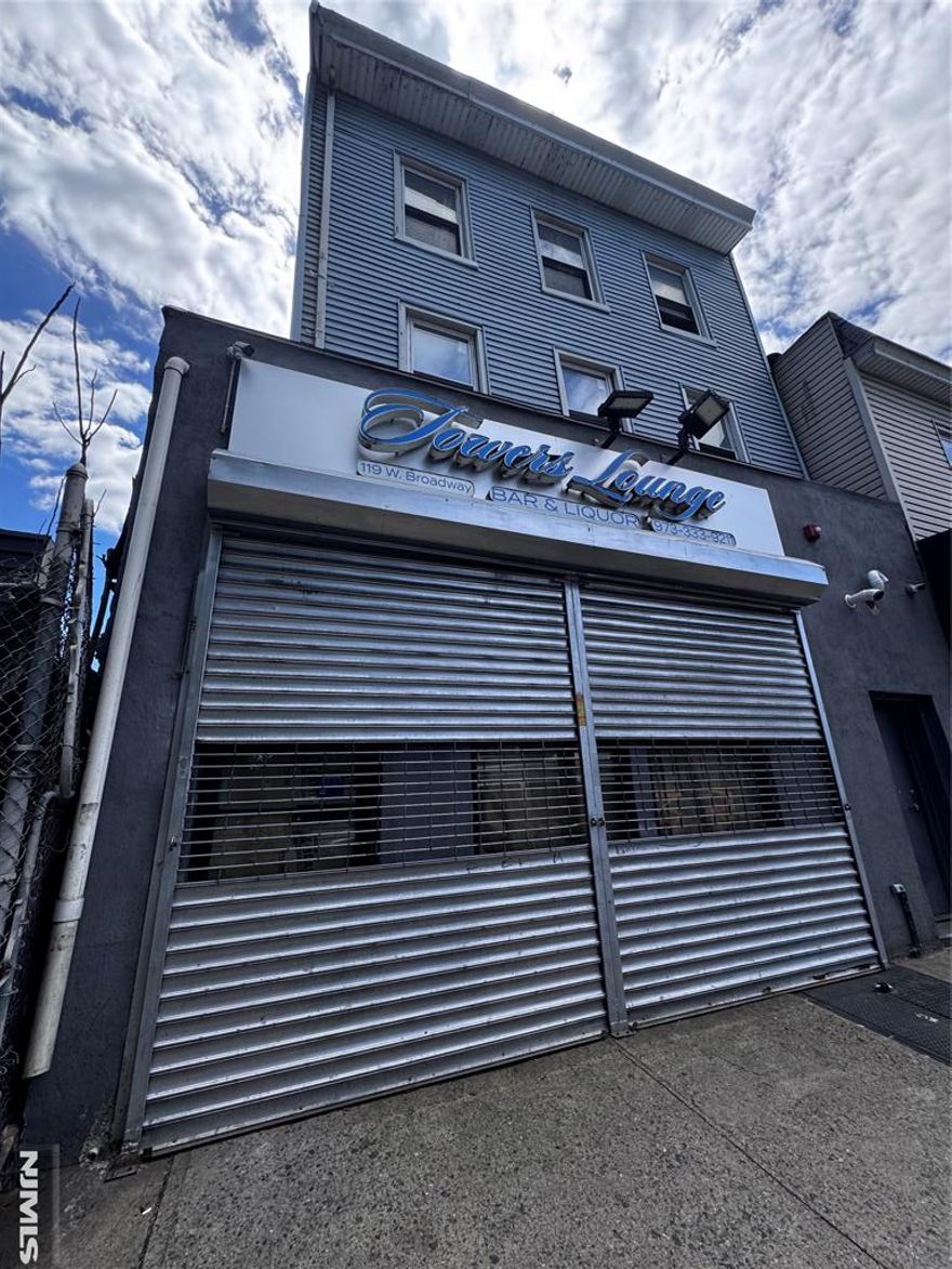 Amazing Mixed-Use Investment Opportunity in the Heart of Downtown Paterson!This well-maintained mixed-use property offers strong cash flow and an impressive 8% cap rate, making it ideal for both investors and owner-occupants. Ground Floor: Fully operational bar/liquor store, generating steady commercial income. First Floor Apartment: Recently updated with a spacious living room, modern kitchen, 2 generously sized bedrooms, and a full bathroom Second Floor Apartment: Features a large living room, kitchen, 2 bedrooms, a full bathroom, plus a bonus finished attic with an additional full bathroomKey Upgrades: New Roof, Tankless energy-efficient hot water heater ,Baseboard heating Located in a high-traffic area of downtown Paterson, close to transit, shops, and restaurants. This is a rare chance to own a high-yielding, turn-key asset in a growing market