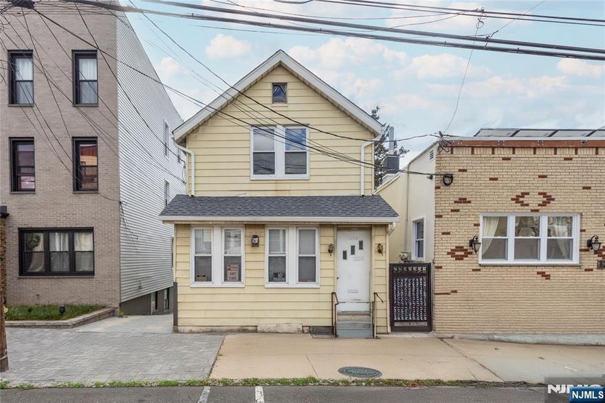 Two-Family home with great potential. Located in downtown North Bergen., very desirable area, close to public transit and Jersey City Heights. The Property needs some TLC but offers an excellent investment opportunity or a perfect project for an owner occupied.