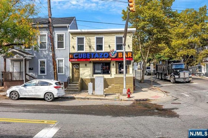 Totally renovated 2023 Excellent opportunity to own a mixed- use building near the center of Paterson. First floor EL CUBETAZO BAR & KARAOKE & SPORTS "Sale with out liquor lic" second floor 2BRS combo LR kit full bath central air full unfinished basement 1/2 bath. Brand new refrigeration equipment, 2 glass door back bar coolers, 1 bottle cooler and 1 ICE machine 3-compartment sink, 1 additional sink, 2 ice bins with 7 circuit boards, 1 glass rack and 1 Glass washer machine 2 soda gun system connected to the ice bin 1 additional standing freezer (apartment)Granite countertop Brand new furniture, bar stools & tables, regular chairs & tables, and leather couches Crown molding LED lighting Recessed ceiling lighting 2 JBL speakers 10 in-ceiling speaker SONOS system 13 Samsung Smart TVs Fully wired Ethernet cabling for every Smart TV HDMI wiring for every Smart TV HDMI switch HDMI splitter 1 EPSON projector plus 120' electric screen Digital LED display for front window Hardwood floor.