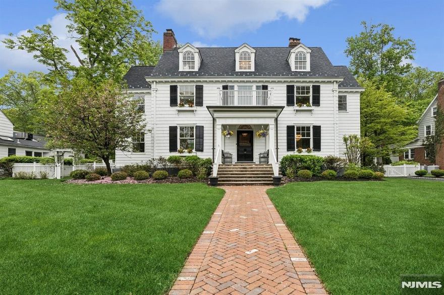 Exquisite Estate Home on Edgemont Park. Perched on the threshold of Edgemont Park, this exceptional home beautifully combines the enduring charm of early 1900s architecture with sophisticated modern updates designed for today's lifestyle. Thoughtfully renovated throughout, the home offers an ideal balance of functionality, comfort & style. Its prime location provides direct train access to New York Penn Station or Hoboken, with downtown Watchung Plaza just moments away for convenient shopping, dining & local amenities. Inside, you'll find six spacious bedrooms among 14 total rooms, including a dedicated workout space. Elegant formal living & dining rooms, a cozy family room, & a screened-in porch provide inviting spaces for daily living & entertaining. Additional features like the finished basement, second-floor laundry & mudroom enhance everyday convenience. The gourmet kitchen is a standout, equipped with high-end appliances including a commercial-sized fridge/freezer, double oven, large wine cooler & a Miele coffee/espresso station in the butler's pantry. A dramatic waterfall island & oversized 48 inch undermount sink make this a true chef's haven. The screened-in porch opens to a professional-grade outdoor grilling area, while the expansive Bluestone patio invites relaxation & alfresco dining. The fenced backyard is a dream for all ages, featuring a playground, treehouse & trampoline offering something for everyone .A timeless blend of classic elegance & modern luxury.