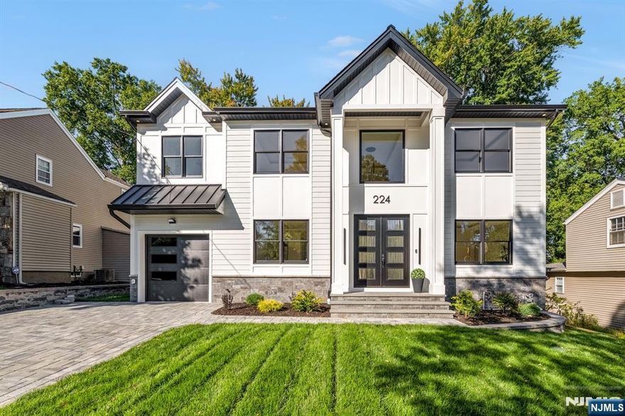 Experience exceptional quality and craftsmanship in this gorgeous new build! Designed with timeless elegance and a modern, open floor plan, this home offers 5 bedrooms, 5 full bathrooms, and 2 half baths, with every bedroom featuring its own en-suite bathroom & walk-in closet. A welcoming foyer opens to formal living and dining rooms, leading into a spacious great room with fireplace that flows seamlessly into the showstopping chefâ€™s kitchen. Highlights include professional-grade appliances, a massive center island, custom cabinetry, and a butlerâ€™s bar with wine fridge. The first floor also includes a versatile bedroom suite, full bath, and stylish powder room. Upstairs, the luxurious primary suite is complete with a spa-inspired bathroom and two custom walk-in closets. An upstairs laundry room and additional en-suite bedrooms ensure convenience for all. The large finished basement offers endless possibilities with a huge recreation room, utilities, and powder room. Attached 1-car garage plus oversized driveway. New construction built on an existing foundation. Located on Manning Ave in the heart of River Edge, this home is within walking distance to top-rated schools and NYC transportation.