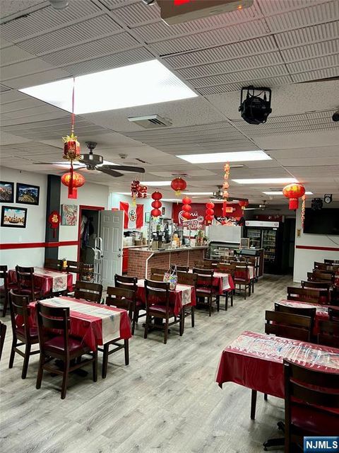 Photo of 72 Passaic Street, Passaic, NJ 07055 (MLS # 26010406)