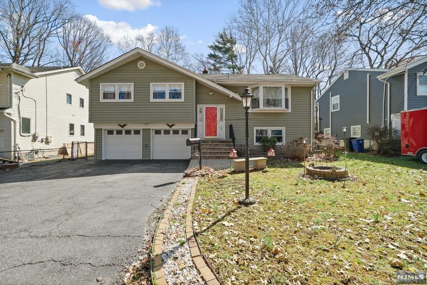 Located on a dead end street with green acres across the street. Newer multi level deck and siding on house done in the last 6 years. Furnace and circuit breaker box replaced in 2011.Modern open kitchen flows into the dining room and living room. Master bedroom has its own full bath. Lower level has a bedroom and a full bath. Family room on lower level opens up to the backyard and deck area. Close to transportation and train.