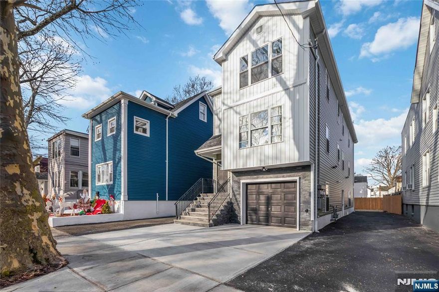 Exquisite New Construction Residence in Irvington-Experience refined living in this impeccably crafted new construction multi-unit home offering a total of 6 bedrooms and 4.5 baths, designed for both elegant owner-occupancy and premium investment potential. Each residence features central air conditioning and forced hot air, delivering year-round comfort and efficiency. The chef-inspired kitchens are beautifully appointed with striking quartz countertops, oversized center islands, and dishwashers, blending sophistication with everyday functionality perfect for entertaining and elevated daily living. Sun-filled open-concept living and dining areas showcase modern finishes and thoughtful architectural details throughout. The primary suite serves as a private sanctuary, complete with a spa-like ensuite bath. An attached garage paired with an exceptionally rare 7-car driveway provides unparalleled parking convenience. This distinguished property offers the luxury of new construction with proximity to shopping, schools, transportation, and major highways. A rare opportunity to own a statement multi-family residence that seamlessly combines space, design, and modern luxury in the heart of Irvington. The property qualifies for CRA loan programs offering below-market interest rates and no private mortgage insurance. Taxes are subject to change post closing Seller will apply for Tax Abatement with the Township.