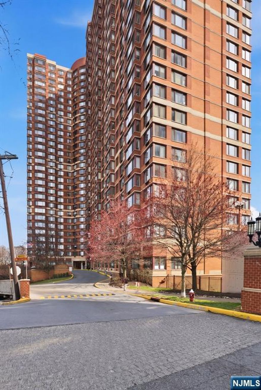 Priced to sell quickly!...Perched on the 23rd floor of Fort Lee's prestigious Palisades building, this well-appointed 1 bedroom, 1 bathroom residence offers approximately 785 sq ft of refined living space featuring an open-concept kitchen, hardwood flooring, and in-unit washer/dryer. Residents enjoy a full suite of luxury amenities including 24-hour doorman and concierge, fitness center, outdoor pool, BBQ terrace, and community lounge. Ideally situated moments from the George Washington Bridge with direct Manhattan bus service, and within close proximity to top-rated schools, fine dining, and premier shopping. An exceptional opportunity to experience elevated suburban living with seamless access to New York City. Vaùcant for immediate occupancy, can show anytime! Come visit today.