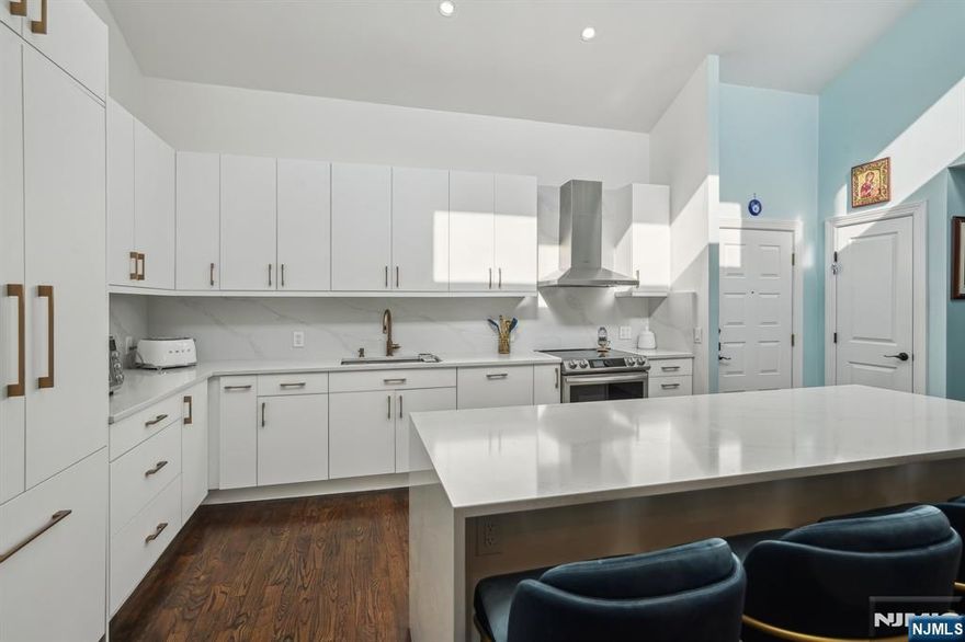 Experience luxury one-floor living in this fully renovated (2022) 3,300 sqft. condo in the heart of Cliffside Park. Designed with impeccable detail, this sprawling home offers 4 bedrooms plus a bonus room. The open-concept layout features a stunning chefâ€™s kitchen with a waterfall island, walk-in pantry, & custom bar, flowing seamlessly into the spacious dining area & living room. A cozy fireplace & breathtaking NYC views enhance the inviting ambiance. The expansive primary suite is a private retreat with a custom walk-in closet, spa-like bath, & fireplace. A standout feature is the sprawling wraparound terrace, accessible from both the living room & primary bedroom, perfect for relaxing or entertaining against the dazzling city skyline. With all-new finishes, recessed lighting, two-zone heating & air, four indoor parking spots, & NYC bus right at your doorstep, this exceptional home offers the perfect blend of sophistication, convenience, & style. Donâ€™t miss this rare opportunity! Contact Ani 201-913-6678.