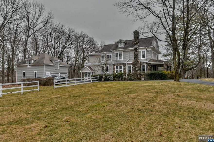 This Dutch Colonial has been owned by only 4 families since 1906! Offering 7 BR's & 3.5 baths w/ amazing natural light. Old world charm w/ stone facade & gorgeous front porch that partially wraps around to the oversized dining room w/ high ceilings & built ins maintained w/ tender loving care. Highlights include a large kitchen, open family room for sophisticated living w/ fireplace, a private library, & open sitting area perfect for enjoying the morning sunrise. The grand staircase leads upstairs to 4 BR's all generously sized w/ 2 full baths & laundry. The primary suite w/ a newly renovated bath overlooks the lush & private backyard. The 3rd fl has another 3 large BR's w/ 1 full bath. There is a side entrance/mudroom off the driveway that leads to a large basement w/ work area recreation room. There is a 2 car separate garage w/ a full size loft above. The backyard has a tiered patio, inground pool & tennis court. This is one of Allendale's oldest & finest. IT IS A MUST SEE