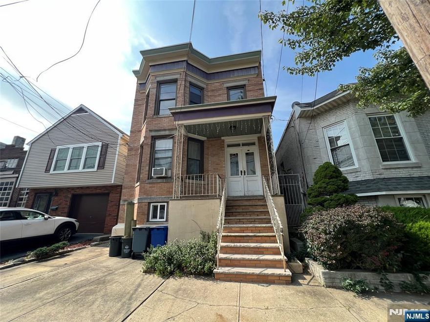 Legal brick 2-family home fully updated in 2022 â€” ideal for owner-occupants or investors! Both units feature high ceilings and oversized windows that fill the space with natural light. The first-floor unit offers 3 bedrooms and 1 full bath with direct access to the rear deck and yard. The second-floor unit includes 2 bedrooms, 1 full bath, plus a versatile bonus space perfect for a home office or workout area. Super low taxes make this an exceptional opportunity!