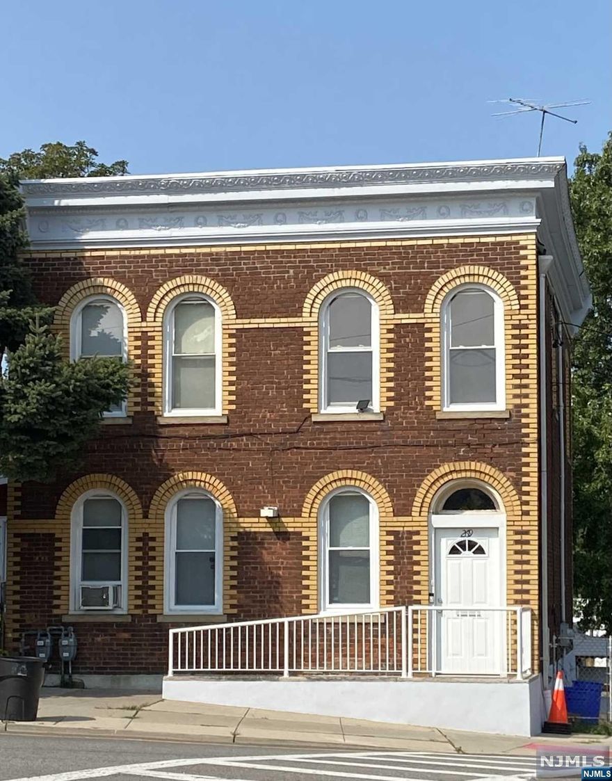 Solid All-Brick 2 Family with Beautiful trim. Oversized yard and driveway parking for multiple cars. Bonus Room with Sep entrance. Many updates : New Windows, Painted Exterior, Electric panel. Great investment or owner-occupied, conveniently located near transportation and shops. Sold in "as-is" condition. Photos of first floor prior to occupancy.