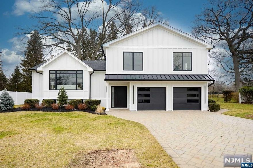 This spectacular home was fully renovated from top to bottom. All custom design with top-of-the-line materials. New primary bedroom with gorgeous full bath. The kitchen has all top-of-the-line appliances, the main floor is a beautiful open floor plan with a large family room that has custom sliding doors which leads to a large spacious deck. The view from the back of the house overlooks the golf course of White Beaches Country Club. This home is a private oasis! Every room and every detail have been addressed and updated. There is a beautiful sitting area on the lower level for watching TV or just relaxing. In addition, there is a large separate playroom for the kids. A large two car garage as well. If you are looking for the best of everything, this house is it!!!!