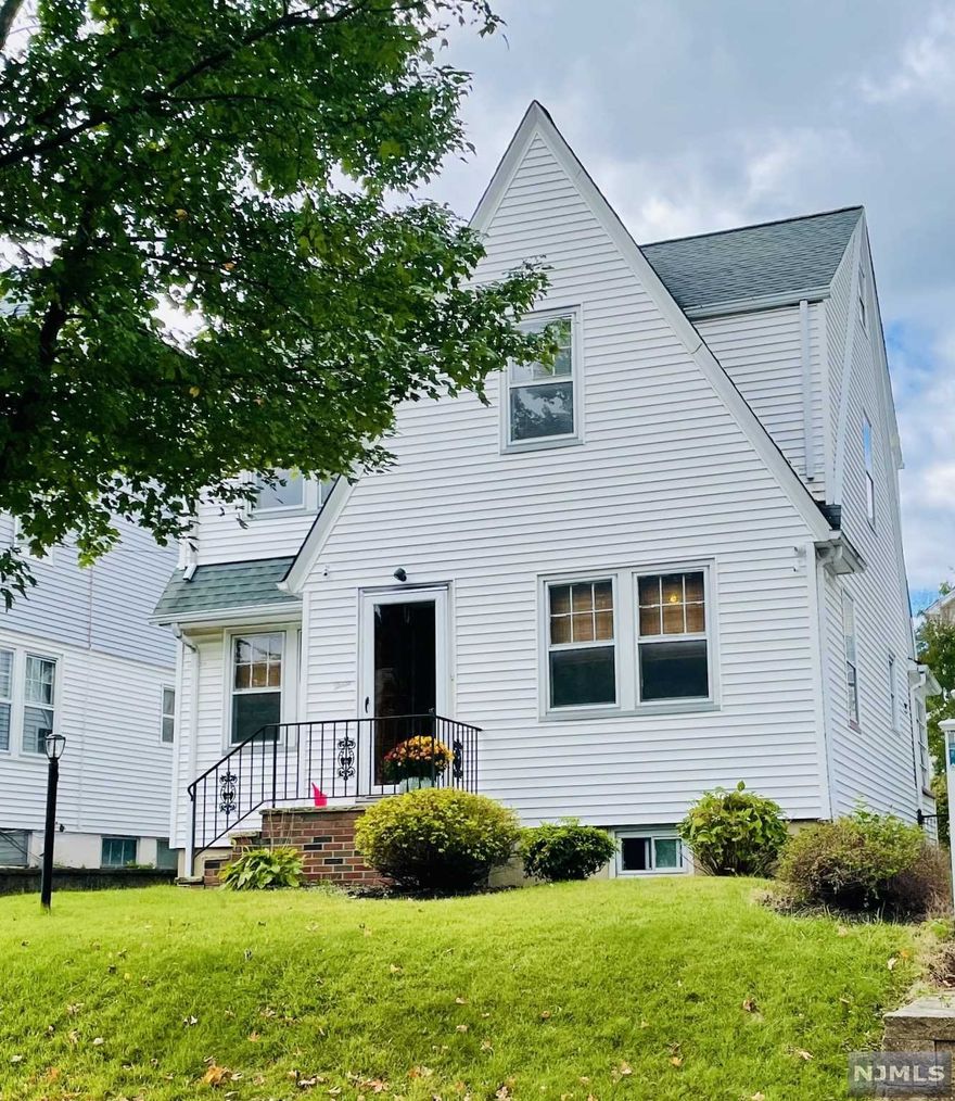 Beautifully Maintained 3 Bedroom 1.5 Bath Colonial on a Dead-End St in the West Orange Lourdes Section close to Montclair Border. Homes features Hardwood Flooring, Wood Burning Fireplace with Original Built-Ins, Formal Dining Room, Large Kitchen with Dutch Door the leads to Enclosed Porch. Partially Finished Basement with Half Bathroom. Fenced in Backyard with Detached Garage with Long Paved Driveway. Updates such as Roof, Boiler and Hot Water Heater. Located near Major Highways, Parks, Shopping and Montclair Dining.