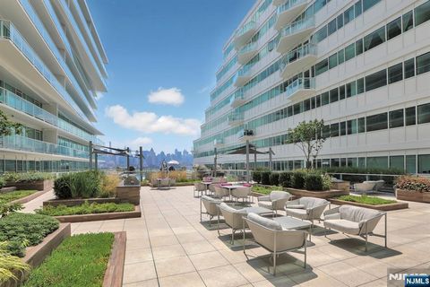 Photo of 800 Ave At Port Imperial #308, Weehawken, NJ 07086 (MLS # 25039543)