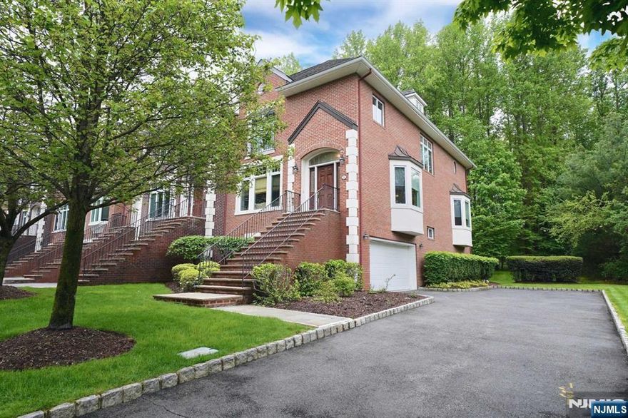 Elegant townhouse available in Old Tappan! Rarely does a home like this come to the rental market. This end unit home features 4 bedrooms, 3.5 baths, an ELEVATOR to all three floors, open floor plan, hardwood floors, family room with floor to ceiling stone fireplace, gourmet kitchen with sliding glass doors to deck, finished lower level with rec room with sliding glass doors to patio, bedroom and full bath, two car garage with private driveway with plenty of parking and central vacuum. Approx. 3,600 s/f. Easy commute to NYC, Palisades Parkway and Westchester. No pets.