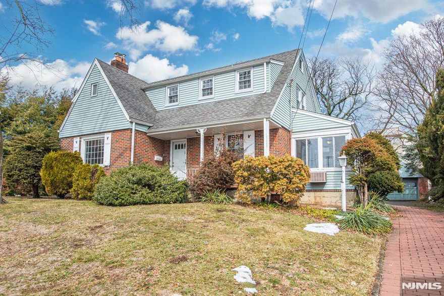 This Colonial home sits on an expansive 75x128 lot, exceptionally sized for homes of its type and size. This 3BR/2.5Bath home features lovely wood floors throughout, a formal dining room, both a Living Room and a Family Room/Den, as well as a charming 4-season Sunroom with heat and A/C. This sun-filled and relaxing space boasts a stylish brick wall and contiguous windows. This special home has all of the prized features for which a Buyer would be looking: a great floor-plan flow, an inviting front porch, a large yard that can be enjoyed from the patio, a detached 2-car garage, and a paver driveway. The Bedrooms are generously-sized, and 2 of the 3 have walk-in closets. The partially finished Basement is comprised of a large open space, only limited by one's vision. The HVAC system, as well as the Hot Water Heater, are newer. An additional impressive bonus feature is the NYC skyline view that can be enjoyed from one of the upstairs bedrooms! Come, take a tour, and be inspired to put your own signature on this notable home, located in a desirable part of town, close to shopping, restaurants, parks, and schools. Your new home and lifestyle beckon!