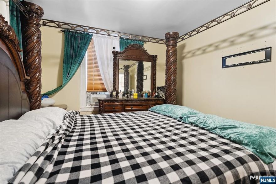 This well-maintained two-family home is a standout investment opportunity, offering the perfect balance of comfort, functionality, and strong rental Income potential. Each unit features two spacious bedrooms, ideal for tenants or owner-occupants alike. One of the property's most unique assets is the -2,000 sq ft garageâ€”a dream space for storage, a workshop, or potential additional rental income. Complementing this is a large parking lot with space for numerous vehicles, enhancing appeal for tenants, business use, or future development. The property offers exciting possibilities, including the potential to build an additional structure on the expansive lot. Whether you choose to live in one unit and rent the other or fully capitalize on both units as income-producing rentals, this property delivers long-term value and exceptional flexibilityâ€”an excellent opportunity for investors, entrepreneurs, or savvy homeowners looking to make a smart move.