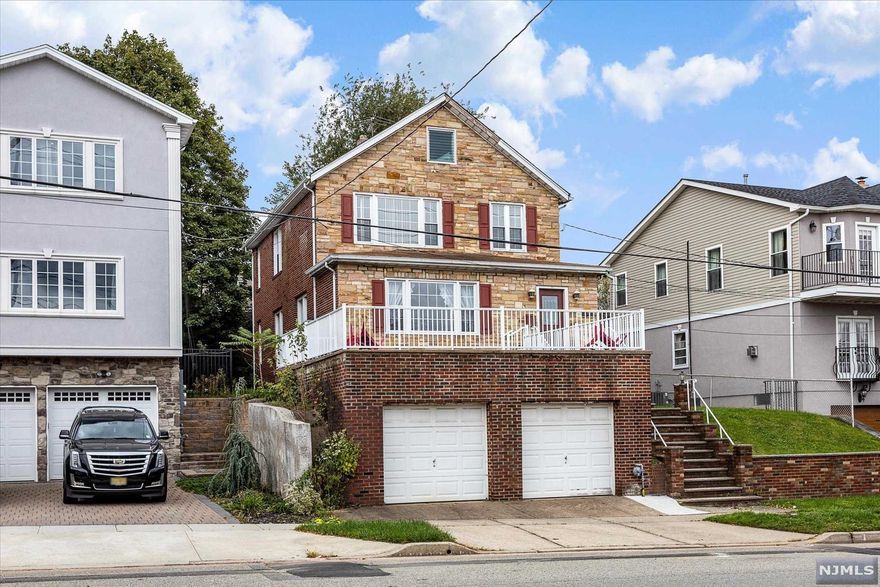 Welcome to this 2 family home with tons of potential. First unit has Living room/ dining room combo, eat in kitchen, full bath, 2 bedrooms. Basement is unfinished with walk out to 2 car garage. Second floor is 3 bedrooms, living room, eat in kitchen and full bath. Home needs work and will be sold in as is condition.