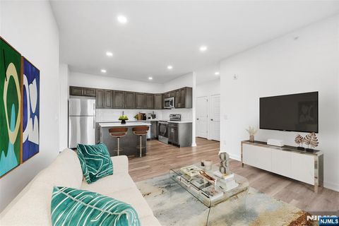 Photo of 315 Railroad Ave #204, East Rutherford, NJ 07073 (MLS # 26000924)