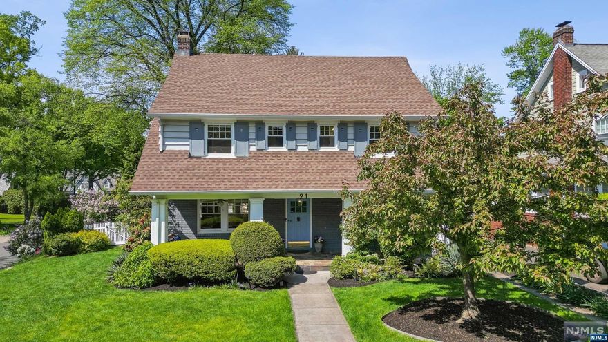 Easy living at 21 Elston where modern updates blend with timeless charm. Nestled in a super, bike riding, ball playing neighborhood, 21 has it all, with a perfect location to boot! Enjoy morning coffee on the porch before you head to the NYC train up the street. Brand new Kitchen is open to the Dining area & will inspire you to whip up great meals for alfresco dining under the stars on the lovely & expansive back Patio! Cozy up by the gas fireplace in the charming Living Room with windows on 3 sides. A great Mudroom keeps you all organized. The finished Lower Level has a full bath & offers a great bonus place to watch a movie or play games. Upstairs you'll find 4 Bedrooms with Primary Ensuite and additional hall Bath. 3rd floor has additional Bedroom & full Bath. Wood floors, beautiful moldings, high ceilings & the grace of a classic 1920's beauty. Great, fenced-in, private outdoor space & amazing location - close to parks, shops, eateries & NYC transportation.