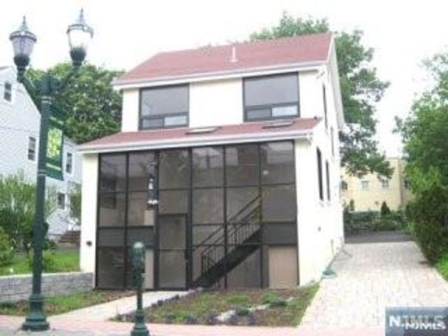 For lease-Entire building near Main Street Excellent opportunity to lease a free standing located just one block from Main Street in a busy,high-traffic area.The property offers approximately 830 sf on the first floor,600 sf on the second floor,and 500 sf of ground-level basement area.The first and second floors each have seperate heating and central A/C,and feature hardwood floors through out.A brick-paved driveway provides access to parking spaces in the rear,along with six(6) permanently reserved spaces in the adjacent municipal lot. The property meets the 9+ parking space requirement for medical use,making it ideal for a doctor's office. Also,good for any kind of retail service business,such as photo studio,pharmacy,spa,salon,tutoring school,music studio.,etc as well as general office use.Currently occupied by a long-term photo studio tenant(since 2010)