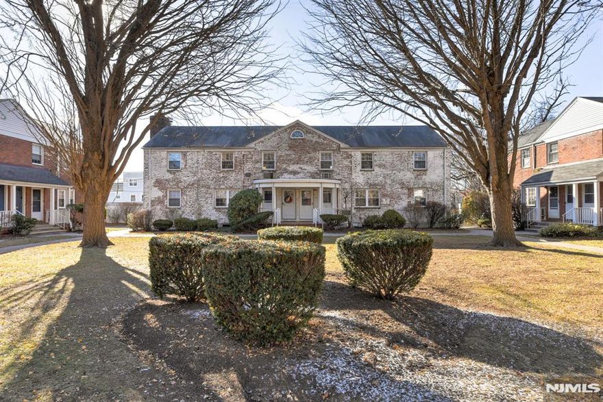 Renovated 2nd Floor Condo in Rutherford Manor w/ covered patio entrance under portico roof. Front door and threshold freshly painted by Association. Storm screen door updated w/ new hardware. Unit improvements include new front door lock set, laminate floor entry, professionally painted w/ new carpet, window blinds, decorator outlets, dimmer switches. Living Room w/ walk-in closet (router), new ceiling fan light and new wall air conditioner. Dining Room w/ new ceiling fan light. Kitchen updates include new laminate flooring, new refrigerator and new over the range stainless microwave w/ fan and light. Hall linen closet. Bathroom w/ new vanity & accessories. Primary Bedroom w/ new ceiling fan light, wall air conditioner. 2nd Bedroom w/ new ceiling light, wall air conditioner. Heat & hot water included. Laundry room in basement w/ two key fobs for access. Designated parking for 1 car. Located 1 min from NJ Transit Bus Stop and 5 min from the Rutherford Rail Station, Orient Way & Park Ave