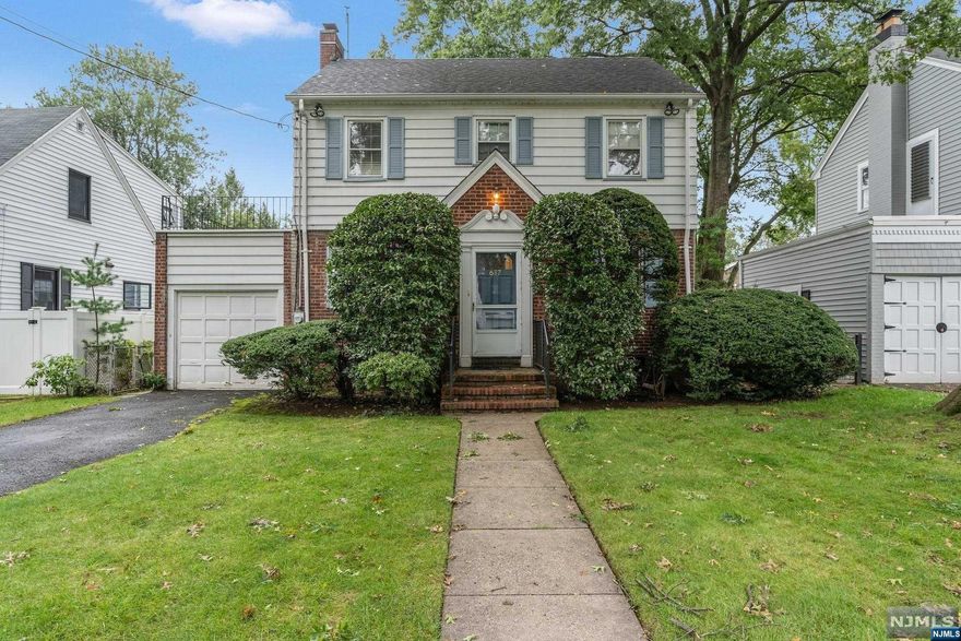 The highlight of this beautiful home in the South of Cedar section of Teaneck is a huge great room with high ceilings and tons of light. Used as an art studio, it would be ideal for a family room/game room or could even be a first floor master suite. Also on the first floor is a living room, dining room, eat-in kitchen and full bathroom. Second floor has 3 bedrooms and a hall bathroom. Basement is full, with half finished with a powder room, and the other half laundry/utility room/storage or workroom. Lovely deck and backyard. 1-car attached garage. Hardwood floors throughout. Central air cooling, forced air heat. Close to houses of worship, shopping, restaurants, schools, public transportation.
