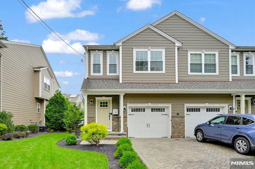 Welcome to 16 McCall Ave a rare opportunity to own a luxurious townhome in the coveted Forest Park Commons with lowest HOA fees! Built in 2019, this spacious 2,100 sq ft residence offers 3 bedrooms, 2 full and 2 half bathrooms, plus a fully finished basement perfect for a home office, gym, or entertainment space.Enjoy the best of modern living with an open-concept layout, high-end finishes, and a semi-private fenced backyard complete with a patio ideal for outdoor dining, relaxing, or play. Located just minutes from Livingston's vibrant town center, you'll have easy access to top-rated schools, restaurants, boutique shops, a convenience store, daycare, nail salon, dry cleaners, and even a Tae Kwon Do studio. Offering the perfect blend of low-maintenance living, prime location, and refined comfort this townhome is not to be missed!