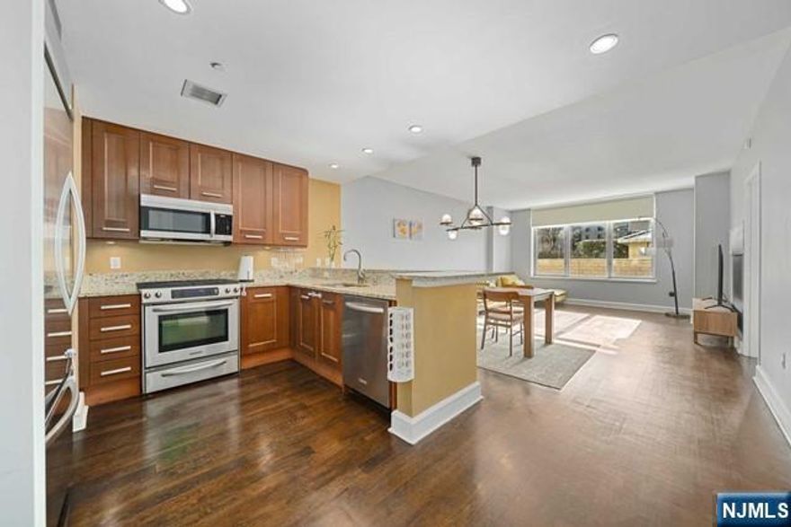 Rarely available ! Welcome to a 2 bedroom 2 bath home in the luxurious Watermark on Hudson!! This South East facing unit is bright and sunny with some views of the NYC Skyline. The floors are all wood in great condition. The 10 line is a perfect size at 1298 sq ft, the largest in the line. It's a corner unit with lots of light. Will all be freshly painted. All stainless appliances, new dishwasher and a new Bosch washer/dryer.The Watermark on Hudson's services and amenities, are second to none. One of the best built buildings the Gold Coast.Over 40,0000 sq ft of amenities including indoor/outdoor pools, fully equipped health club, Childrens' play room, media room, golf simulator, business center, hot tubs, private shuttle to Weehawken Ferry, valet, 24 hr concierge. The perfect home is right here.