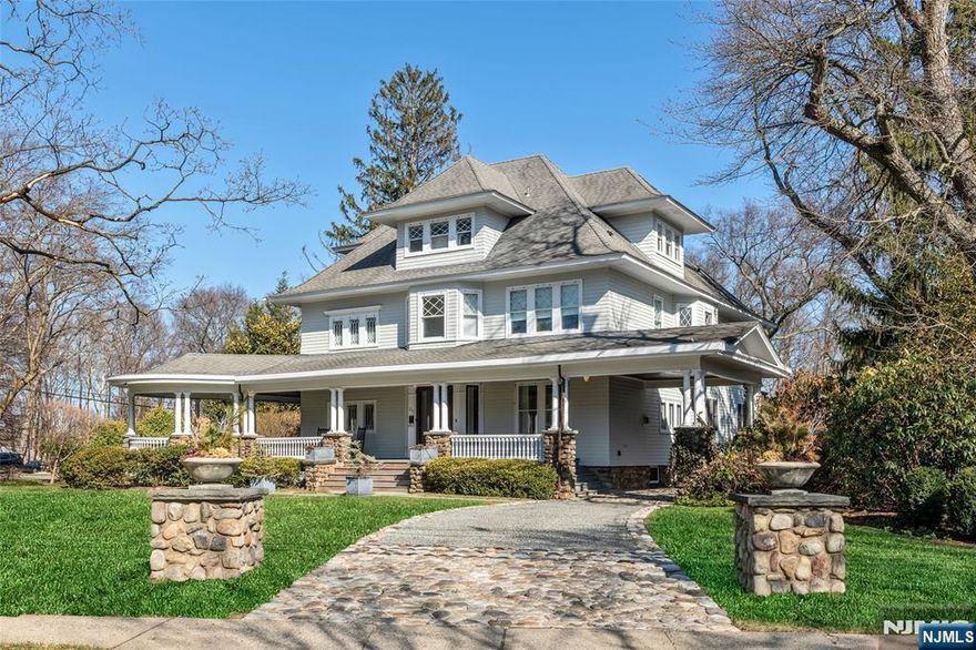 A truly rare offering in the heart of Ridgewood, 317 Prospect is a remarkable pre-war Colonial Revival that feels like a private compound. Set on a sprawling acre of beautifully landscaped grounds, this stately residence blends vintage charm with thoughtful modern updates, creating a 7-bedroom, 4.5 bath home that is both grand and welcoming. The main house offers generous, sun-filled living spaces designed for both everyday comfort and elegant entertainment, with multiple areas to gather, retreat, and spread out. Appreciate amenities such as the covered front and back porches, the sweeping, gallery-style staircase, the well-appointed gourmet kitchen, and the 30-foot great room. The carriage house adds to the homeâ€™s exceptional appeal. In addition to three garage bays, the upper level features an incredibly versatile space ideal for a home office, studio, or gym. The grounds also feature a crushed and cobble stone driveway, automatic gate, and enclosed dog run. What truly sets this property apart is its rare combination of privacy and connected lifestyle. Just moments from Ridgewoodâ€™s vibrant downtown, you can easily enjoy an early morning coffee run, acclaimed restaurants, boutique shopping, parks, schools, and the train to NYCâ€”all while returning home to the peace, space, and seclusion of an acre-sized setting. This is not just a home, itâ€™s a once-in-a-generation opportunity to own a truly special and irreplaceable property in Ridgewood. Owner holds NJ real estate li