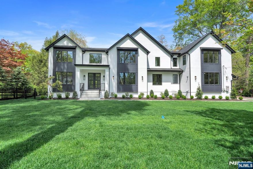 Step into a world of modern luxury with this stunning, fully completed new construction home, featuring 6 bedrooms, 6.5 baths, finished lower level, and spacious 3-car garage. The beautiful outdoor living area including covered porch, fireplace, outdoor kitchen, patio and pool. This exquisite residence is defined by its exceptional high-end finishes, open floor plan with soaring ceilings, and large windows that flood the space with natural light, creating an undeniable flow and design that will capture your heart. Nestled in the coveted town of Demarest, renowned for its award-winning schools and exclusive private golf clubs, this property offers a half-acre lot. It's ideally situated for your convenience, close to shopping, dining, and with easy access to transportation to NYC. Don't miss the chance to make this your new home, where modern luxury meets timeless elegance. Listing agent is related to seller.