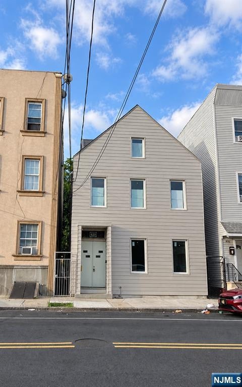 Photo of 418 Walnut ST, Newark, NJ 07105 (MLS # 26034464)