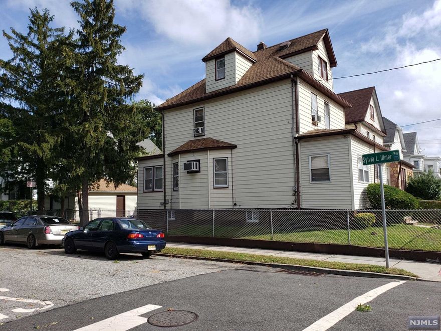 Why rent, when you can buy! You can get a clean, full attic and basement, an extra room/den, a small laundry room next to the kitchen, and a garage with an automatic door. Very well-kept property. Nice & quiet neighborhood. Close to places of worship, all major highways, schools, shopping, restaurants, etc. Stove, microwave, and refrigerator stay with the house. Laundry equipment can be negotiated. Furnace & boiler has been treated annually by PSE&G.