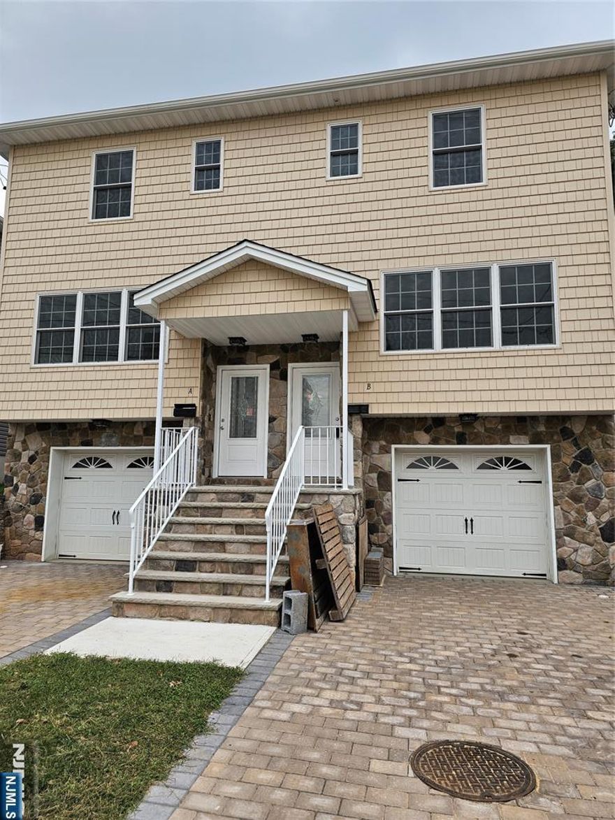 Newly Built Modern Duplex, $729,900 per side features EIK w/island, hi-hat lighting, granite countertops, all Stainless-steel appliances, sliding door to deck 14' x 12', open concept living and dining room. Central a/c, heating w/2 zones, mini-split system on ground level for added heating and cooling. 3 spacious bedrooms, each with double closets, overhead lighting, master bath in master bedroom, 3.5 wide oak wood floor. Anderson tilt windows/screens, colonial-style wide trim casing. Oak hardwood floors throughout. Finished ground level family room, laminate flooring, rear yard and oversized garage access, washer/dryer hook-ups. Each unit includes separate utilities. Conveniently located within walking distance of train, bus and shopping. P